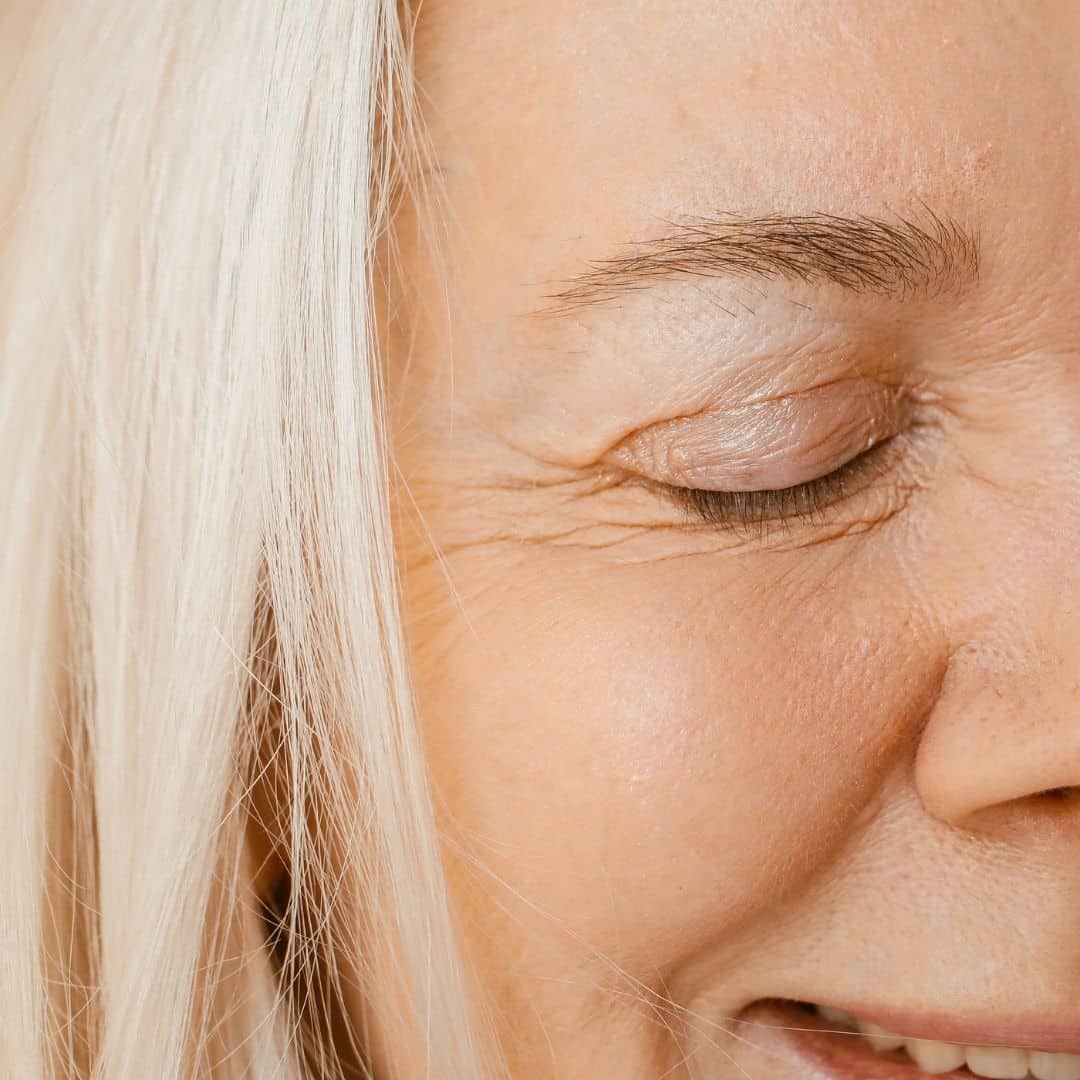 a woman with lines on her face 