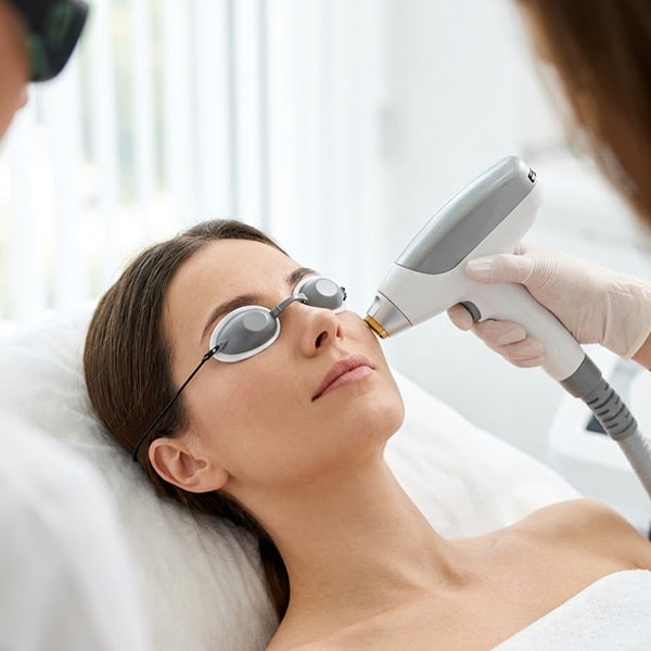 a woman wearing glasses